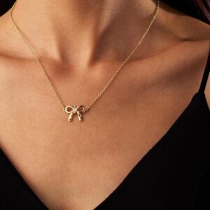 Gold bow necklace